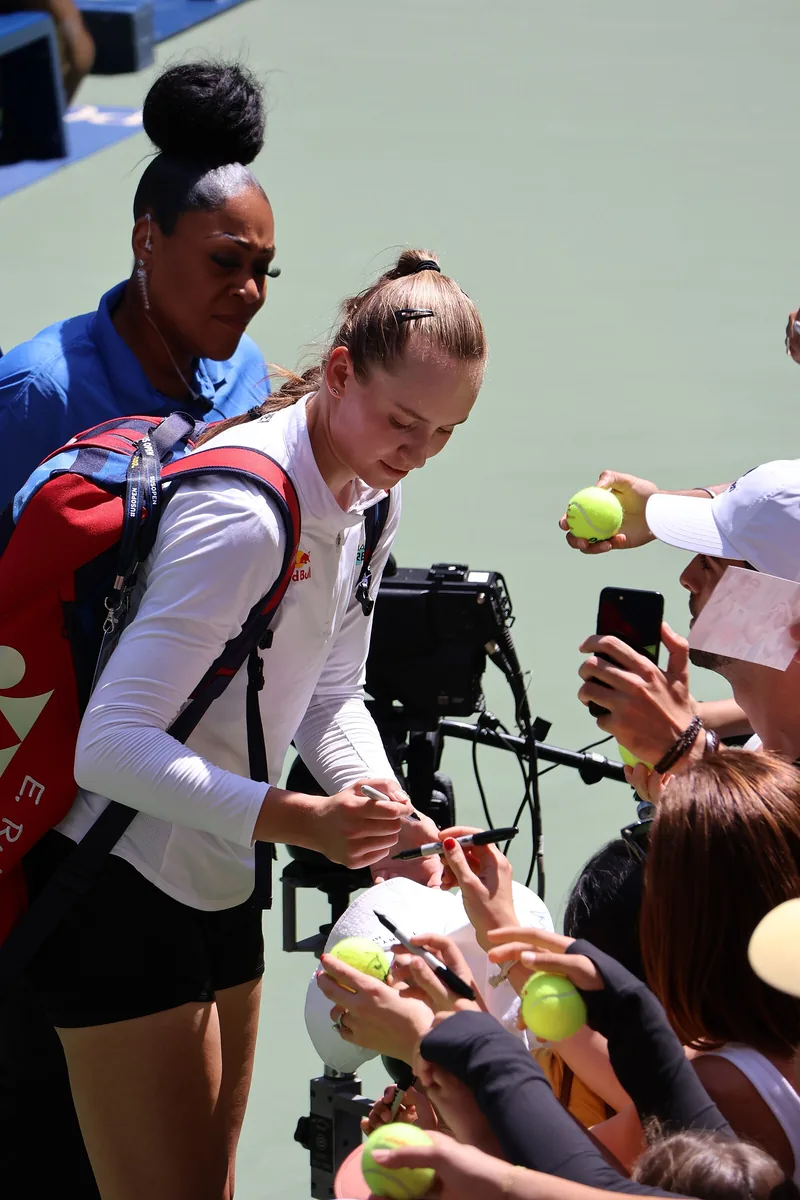 Elena Rybakina signing autographs for fans at the 2023 US Open